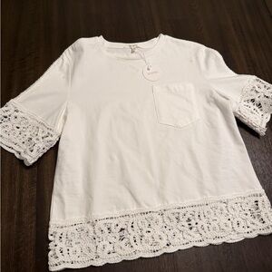 Boutique white white Tshirt with Subtle Detailing